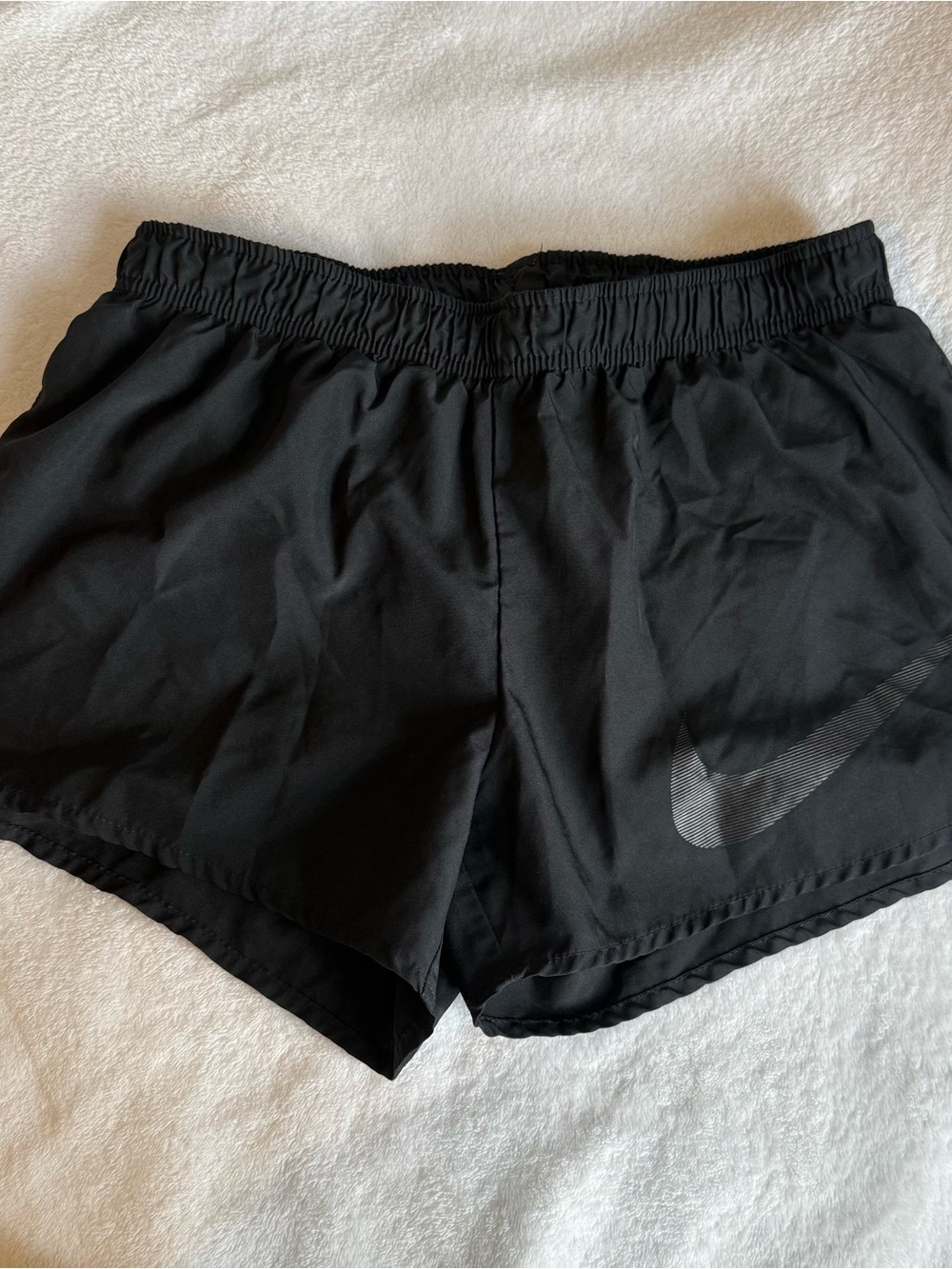 Black Nike running track shorts